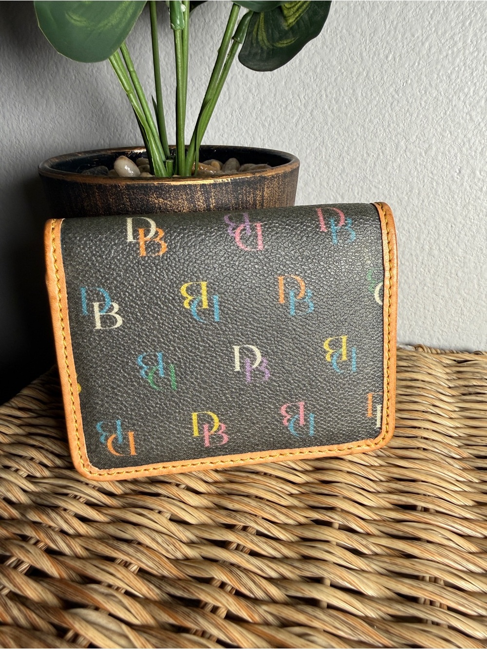 Dooney & Bourke Brown Wallet with Multicolor Logo Print and Tan Trim